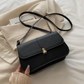 Minimalist black baguette shoulder bag with gold hardware and adjustable strap - Black
