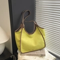 Large yellow canvas tote bag with brown leather trim and handles for daily commute - Yellow-Green Without Charm