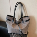 Minimalist grey suede tote bag with black leather straps and metal buckle detail - Gray