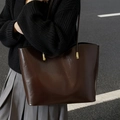 Fashionable dark brown tote bag in glossy leather finish with adjustable shoulder straps - Coffee