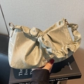 Chic metallic green velvet pleated cloud bag with elegant top handle and metal logo plaque - Green