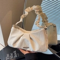 Chic beige ruched velvet handbag with matching scrunchie handle and gold hardware detail - White