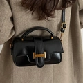 Borsa a tracolla in pelle nera con manico superiore e fibbia dorata elegante - Nero