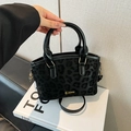 Elegante schwarze Einkaufstasche mit Leopardenmuster, Goldlogo und Pferdehaar-Finish - Schwarz Ohne Anhänger