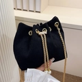 Chic black corduroy drawstring bucket bag with gold chain and pearl accents - Black