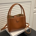Caramel lychee pattern bucket bag with double handles and detachable shoulder strap - Brown