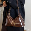 Dark brown patent leather hobo bag with gold zipper detail and adjustable strap - Brown