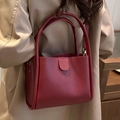 Chic burgundy lychee grain bucket bag with sturdy top handles for elegant work attire - Red