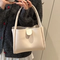 Elegant cream-white litchi texture bucket bag with magnetic closure for daily commuting - White