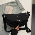 Minimalist black nylon half-moon crossbody bag with dual zippers and adjustable strap - Black