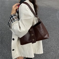 Retro soft leather shoulder bag in dark coffee brown with gold rivet stud accents - Brown