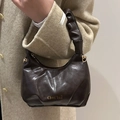 Elegant dark brown ruched handbag with golden hardware and designer logo detail - Brown
