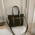 Dark green woven tote bag with leather trim and adjustable shoulder strap in retro style - Green