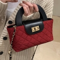 Deep red quilted chain bucket bag with black leather flap and golden twist lock detail - Red