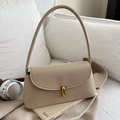 Elegant beige baguette shoulder bag with gold twist-lock and textured leather finish - Khaki
