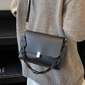 French retro black crossbody bag with braided strap and minimalist leather finish - Black
