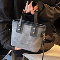 Gray washed leather crossbody bag with black handles and metallic stud details - Dark Brown