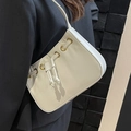 Chic off-white minimalist semi-circle shoulder bag with golden eyelets and knots - White