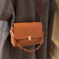 Brown faux leather crossbody bag with golden metal clasp and twisted shoulder strap - Brown