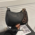 Retro black crescent shoulder bag with knotted strap and decorative pendant detail - Black With Abacus Bread Pendant