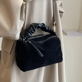 Black suede pillow bag with pleated handle and gold hardware crossbody shoulder style - Black