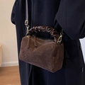 Retro dark brown boston shoulder bag with ruffled handles and a matte suede finish - Coffee