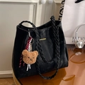 Black large suede tote bag with yellow logo, woven handles and brown bear charm - Black With Plush Bear Charm
