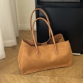 Caramel brown suede tote bag featuring a spacious interior and slender shoulder straps - Brown