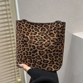 Chic leopard print bucket bag with matte suede texture and slim brown strap - Leopard Brown
