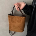 Brown frosted suede bucket bag with dark leather handles and white contrast stitching - Tan
