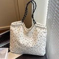 Beige corduroy draagtas met bruine strikprint en spiraalvormig geweven handvatten - Off-wit