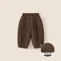 Boy's quilted fleece-lined thermal trousers in dark brown with buttoned leg cuffs - 100 / Bottoms / Brown