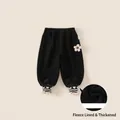 Girl's fleece lined black corduroy pants with 3D flower detail and ruffle cuffs - 130 / Black (Fleece Lined)