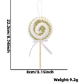 Décoration de Noël sucette pailletée dorée avec pompons blancs et ruban chic - Pendentif Sucette Doré en Spirale