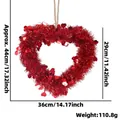 Red tinsel heart wreath with sequins and twine for Valentine's Day party decoration - Medium Red Heart Wreath