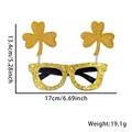 Glittering gold clover glasses for St. Patrick's Day party with spring shamrock details - Gold Shamrock Style