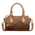 Brown lychee leather cylinder handbag with golden hardware and cherry charm accessory - Brown with Pendant