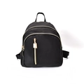 Minimalist black nylon backpack for women with gold zippers and multi-pocket design - Black