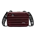 Mini hardshell suitcase crossbody bag in burgundy with a wide woven LOVE strap - Burgundy