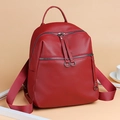 Red washed PU leather backpack for women with circular rings and lychee texture - Red