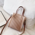 Vertical striped translucent tote bag with brown leather handles and adjustable strap - Pink
