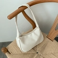 Minimalist white PU leather underarm bag with zipper closure and sleek design - White