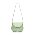 Chic mint green crossbody circle bag with lizard embossed texture and slim strap - Green