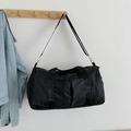 Borsa da viaggio nera capiente con tracolla e tasche laterali per sport e palestra - Nero