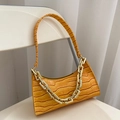 Chic yellow crocodile pattern baguette bag featuring a bold gold chain and leather strap - Yellow
