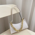 White faux crocodile leather baguette bag with a chunky gold chain strap variant - White
