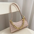 Pink faux leather underarm bag featuring crocodile pattern and decorative gold chain - Off White