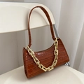 Brown crocodile pattern baguette bag with a chunky gold chain and slim shoulder strap - Tan