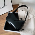 Glossy black hobo shoulder bag in faux patent leather with a minimalist crescent shape - Black