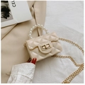 Close-up of cream mini jelly bag with quilted texture, pearl handle and gold chain strap - Off White